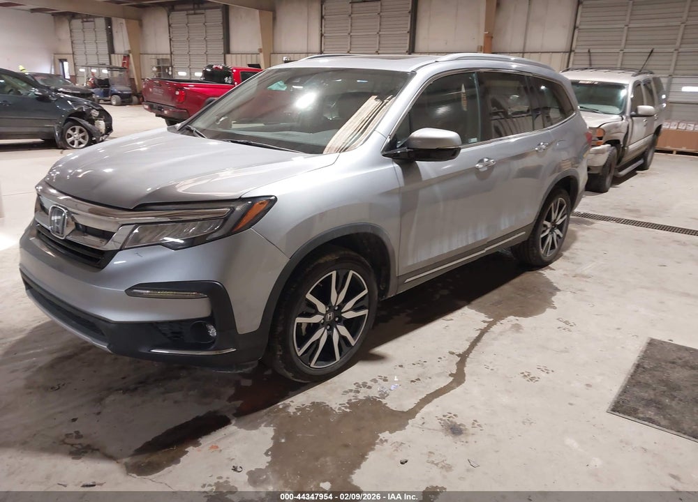 2020 HONDA PILOT 2WD TOURING 7 PASSENGER VIN: 5FNYF5H69LB010894