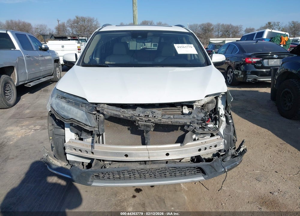 2021 HONDA PILOT 2WD TOURING 8 PASSENGER VIN: 5FNYF5H99MB012267