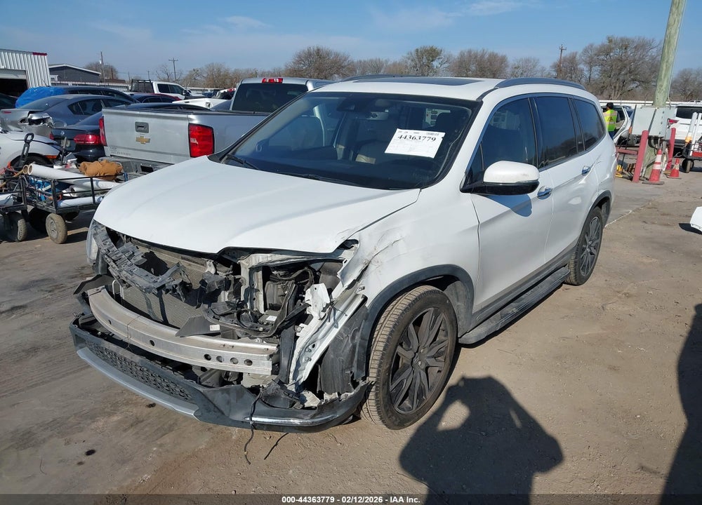 2021 HONDA PILOT 2WD TOURING 8 PASSENGER VIN: 5FNYF5H99MB012267