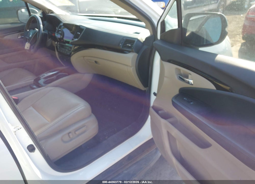 2021 HONDA PILOT 2WD TOURING 8 PASSENGER VIN: 5FNYF5H99MB012267