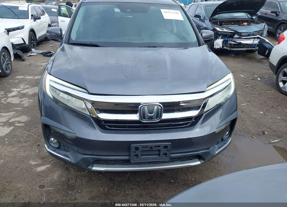 2020 HONDA PILOT 2WD TOURING 7 PASSENGER VIN: 5FNYF5H62LB001471