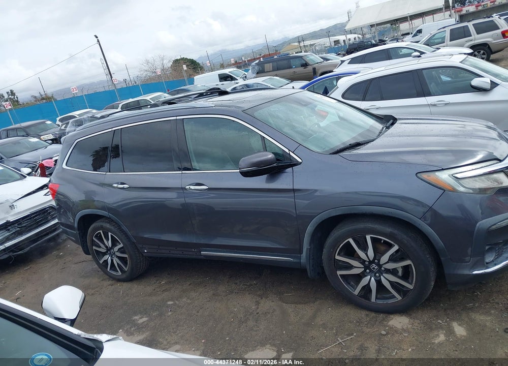 2020 HONDA PILOT 2WD TOURING 7 PASSENGER VIN: 5FNYF5H62LB001471