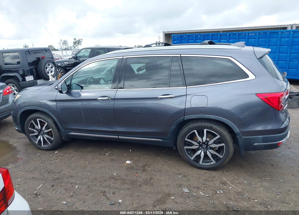 2020 HONDA PILOT 2WD TOURING 7 PASSENGER VIN: 5FNYF5H62LB001471