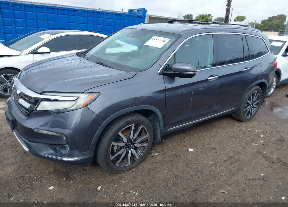 2020 HONDA PILOT 2WD TOURING 7 PASSENGER VIN: 5FNYF5H62LB001471