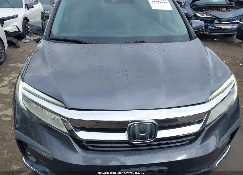 2020 HONDA PILOT 2WD TOURING 7 PASSENGER VIN: 5FNYF5H62LB001471