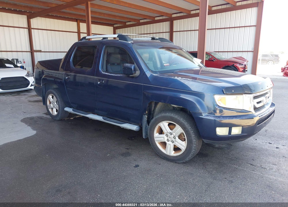 2010 HONDA RIDGELINE RTL VIN: 5FPYK1F51AB006051