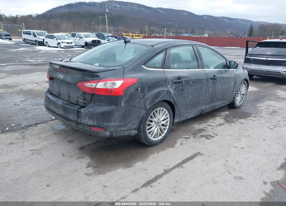 2014 FORD FOCUS TITANIUM VIN: 1FADP3J21EL141573