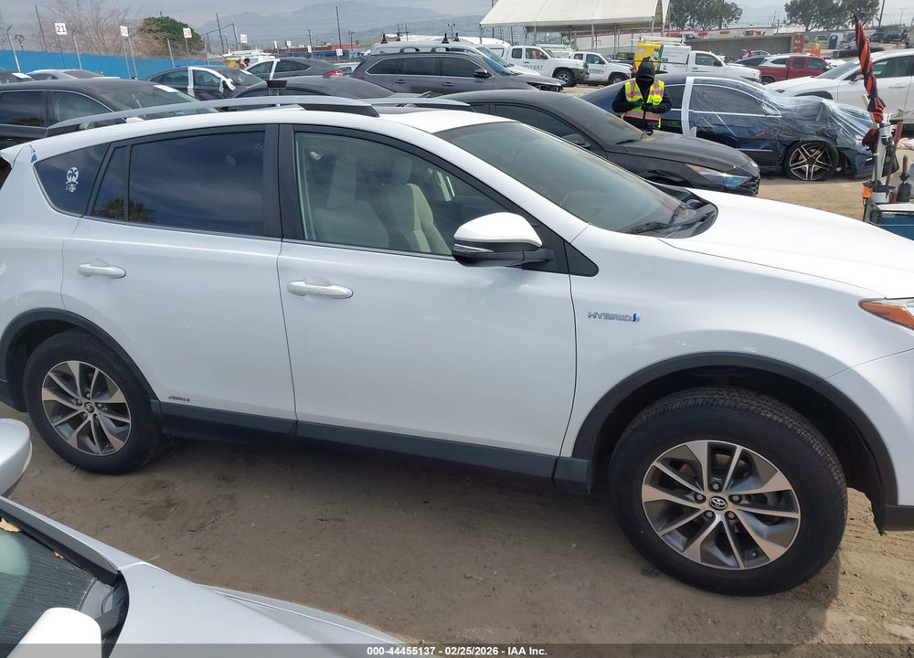 2016 TOYOTA RAV4 HYBRID XLE VIN: JTMRJREV4GD051727