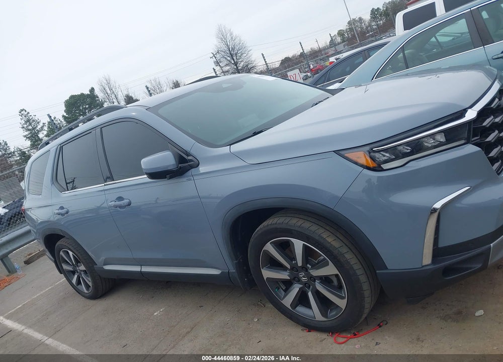 2023 HONDA PILOT 2WD TOURING VIN: 5FNYG2H7XPB003303