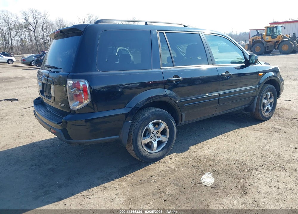 2007 HONDA PILOT EX-L VIN: 5FNYF18597B005667