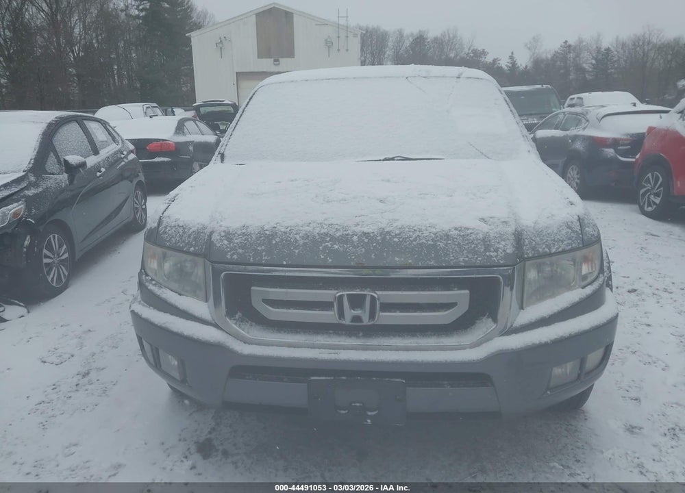 2011 HONDA RIDGELINE RTL VIN: 5FPYK1F58BB011197