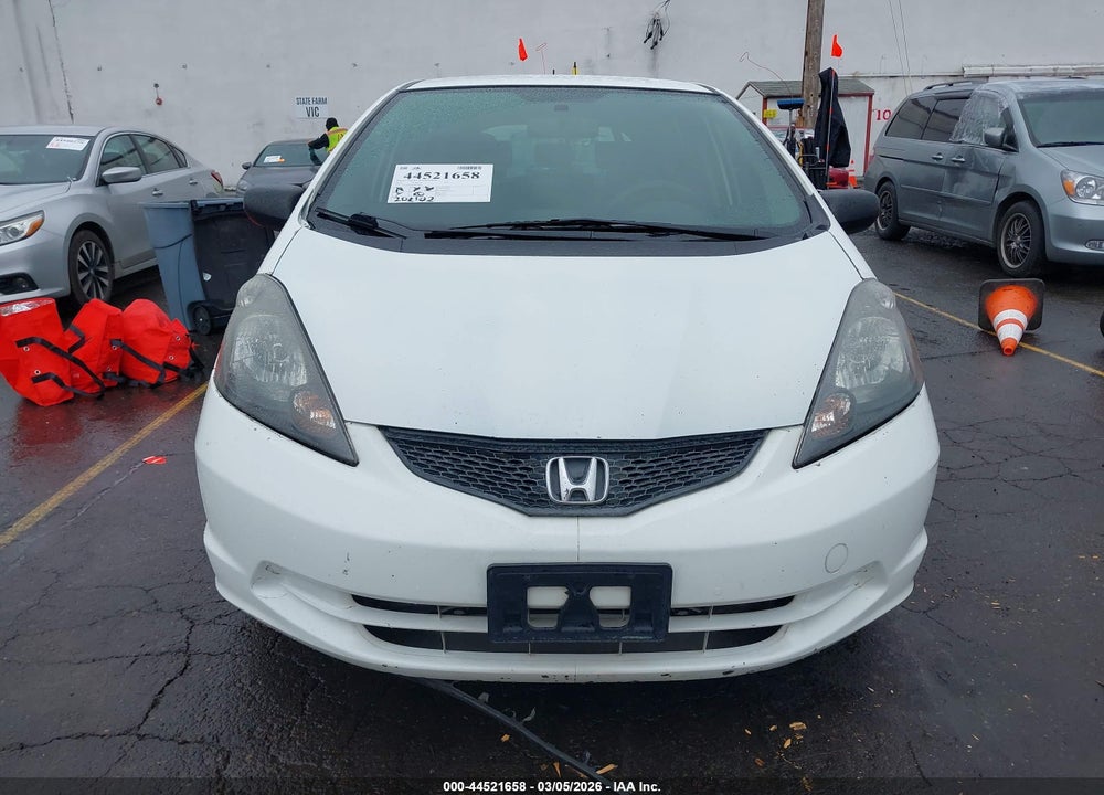 2009 HONDA FIT VIN: JHMGE88299S057074