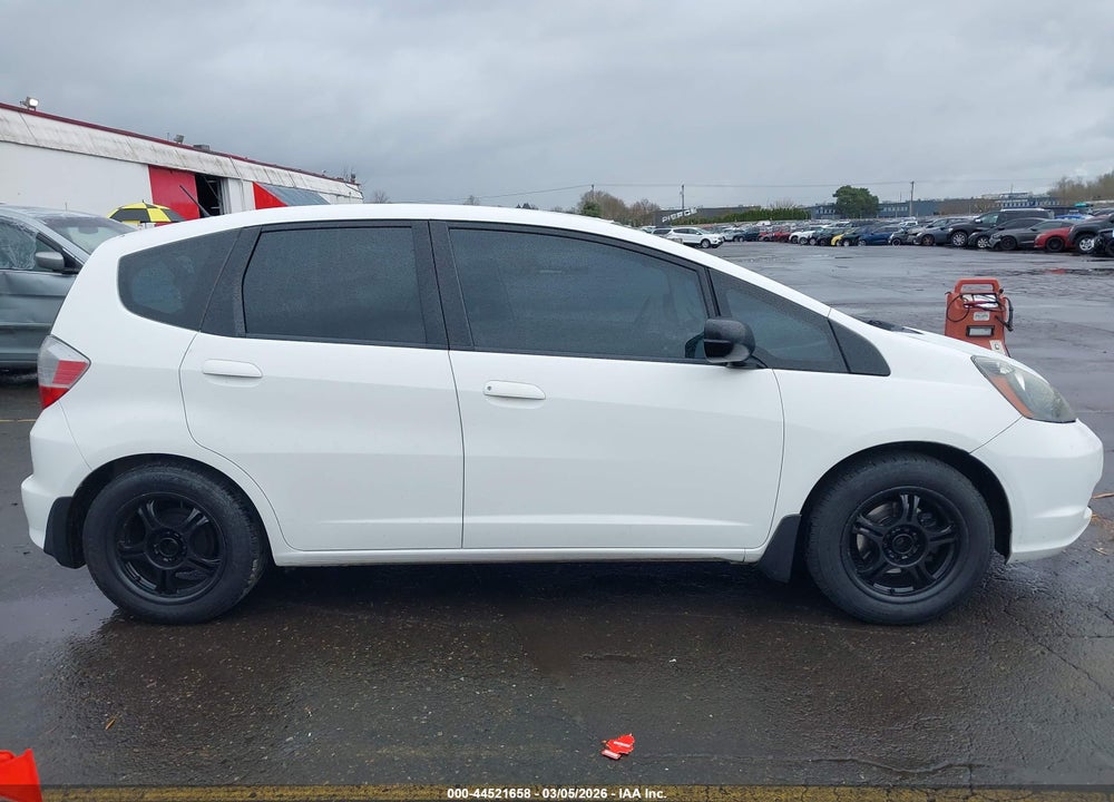 2009 HONDA FIT VIN: JHMGE88299S057074