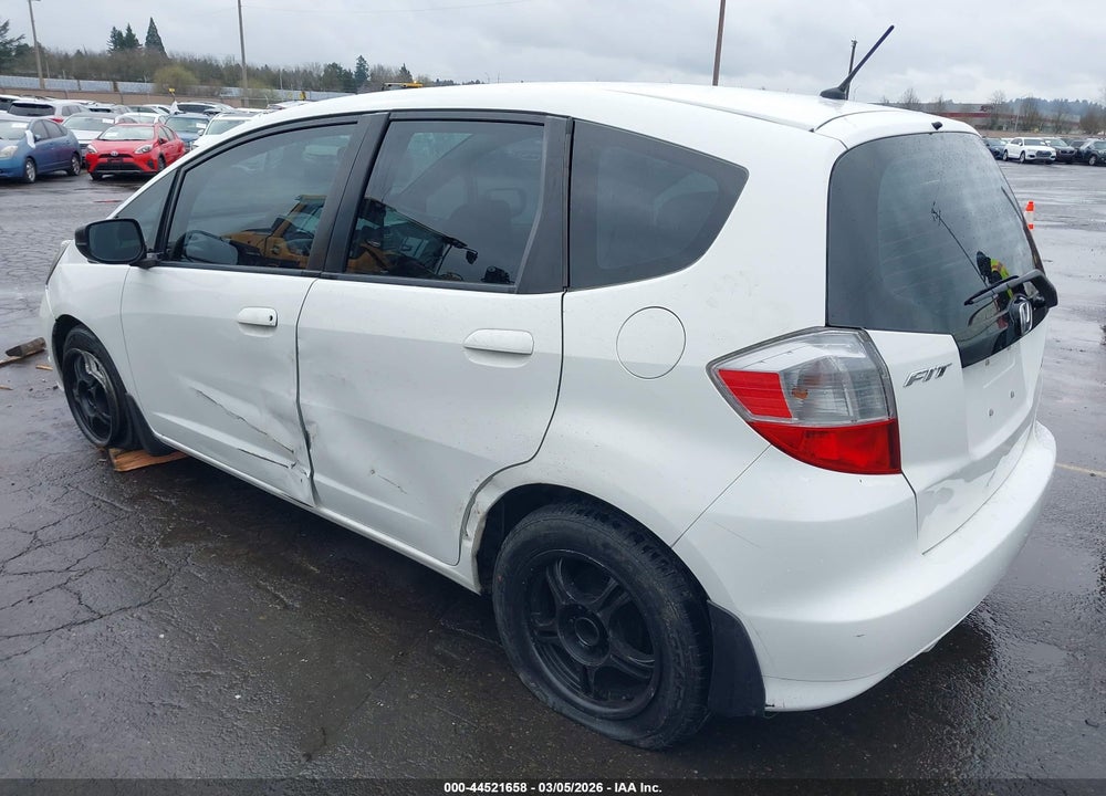 2009 HONDA FIT VIN: JHMGE88299S057074