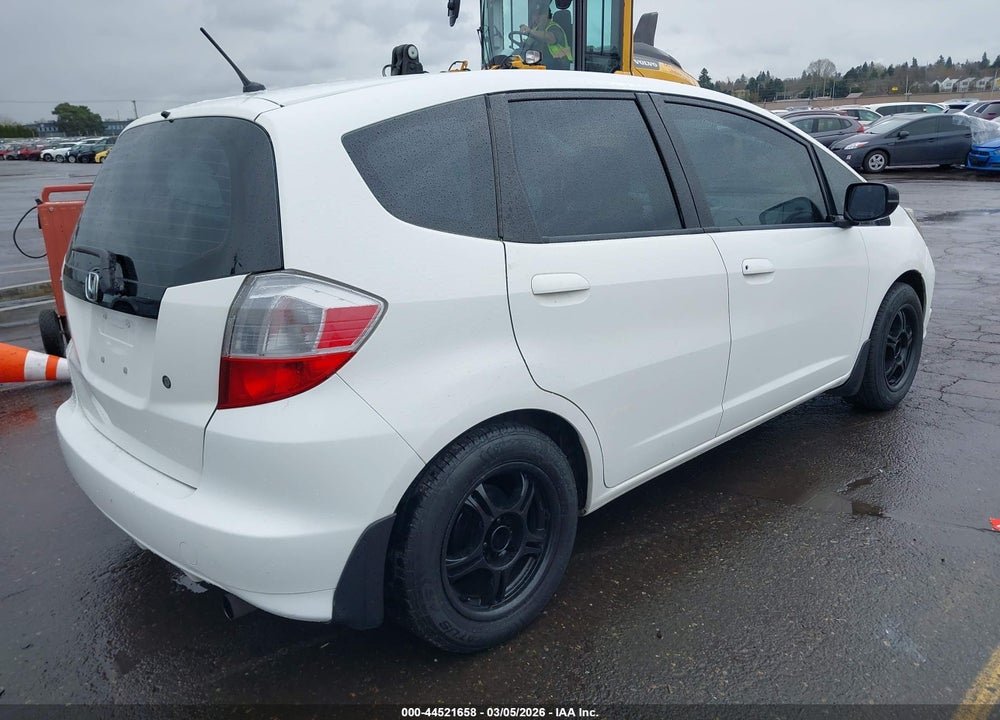 2009 HONDA FIT VIN: JHMGE88299S057074