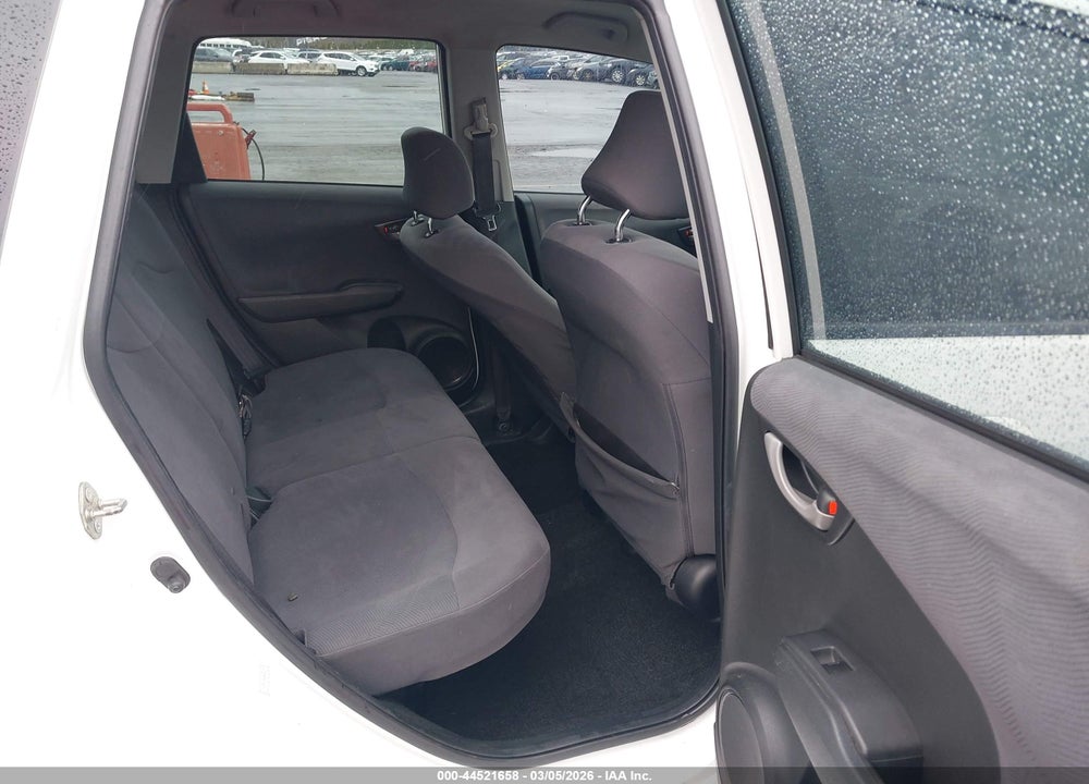 2009 HONDA FIT VIN: JHMGE88299S057074