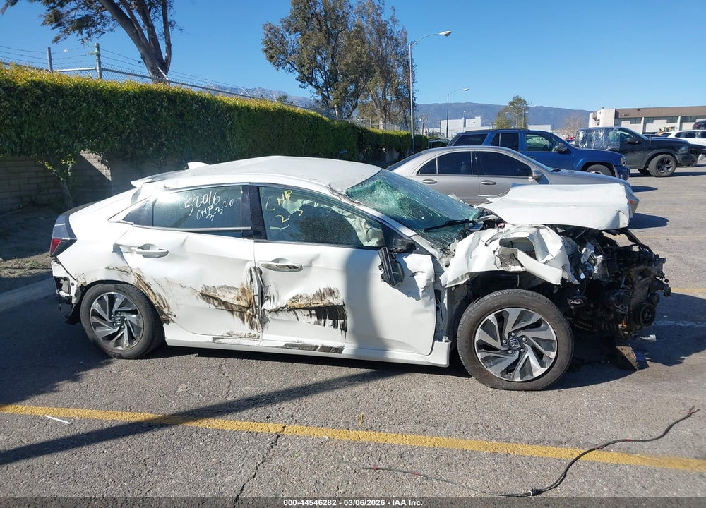 2018 HONDA CIVIC LX VIN: SHHFK7H23JU404821