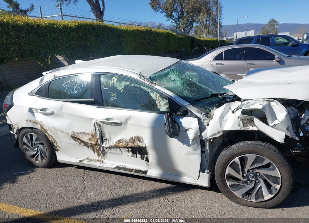 2018 HONDA CIVIC LX VIN: SHHFK7H23JU404821