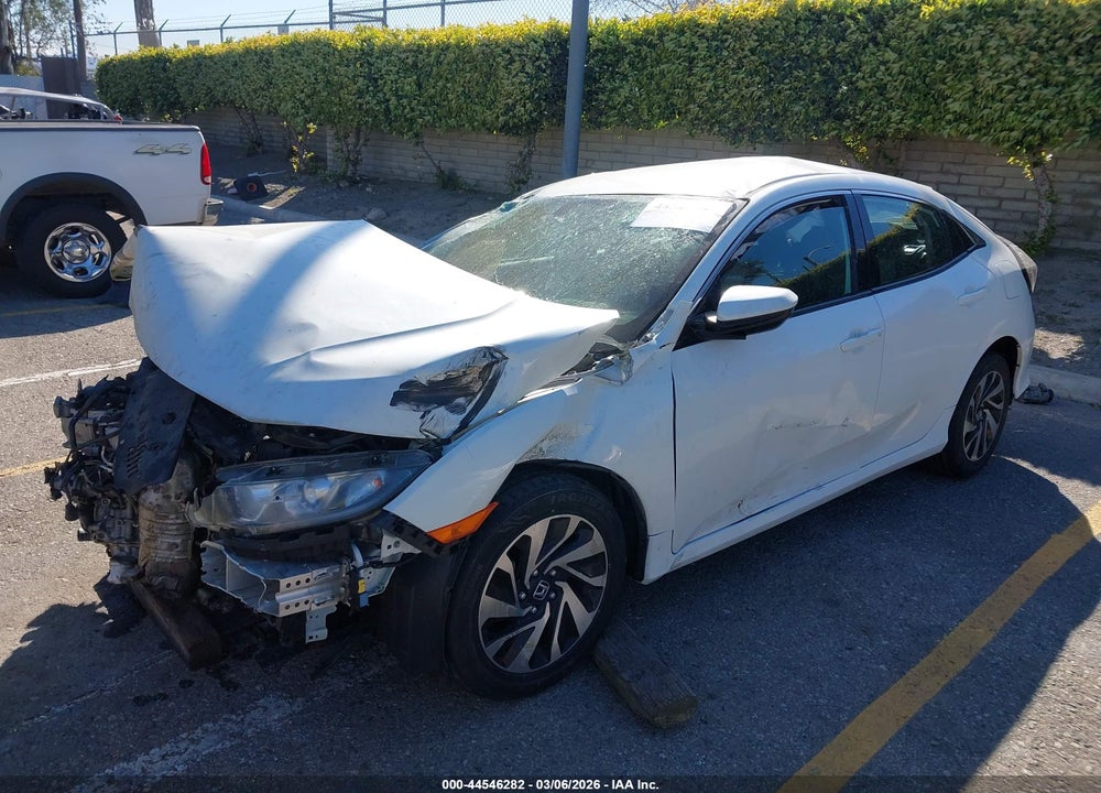 2018 HONDA CIVIC LX VIN: SHHFK7H23JU404821