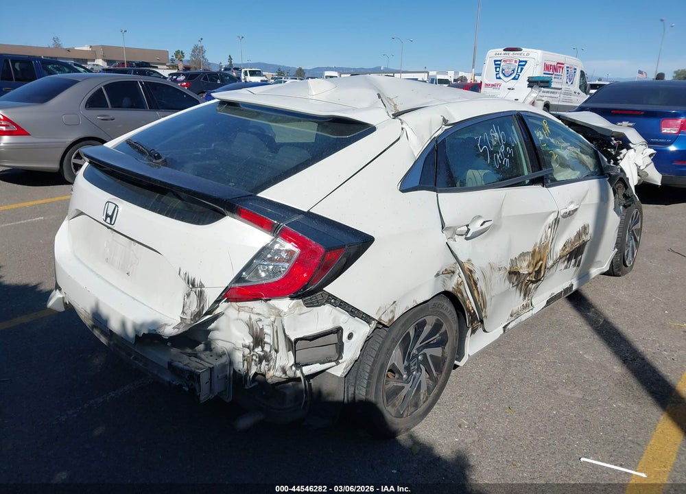 2018 HONDA CIVIC LX VIN: SHHFK7H23JU404821