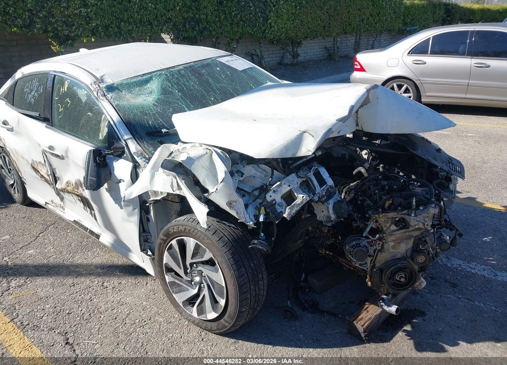 2018 HONDA CIVIC LX VIN: SHHFK7H23JU404821