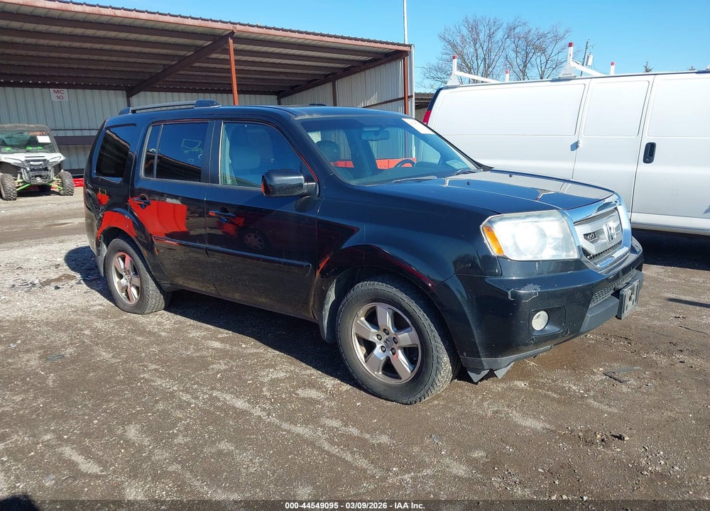 2011 HONDA PILOT EX-L VIN: 5FNYF4H54BB105783