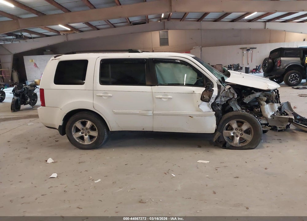 2011 HONDA PILOT EX-L VIN: 5FNYF4H54BB010091