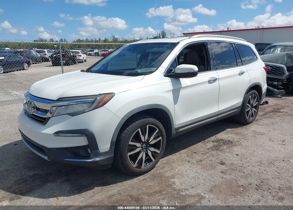 2020 HONDA PILOT 2WD TOURING 8 PASSENGER VIN: 5FNYF5H90LB017713