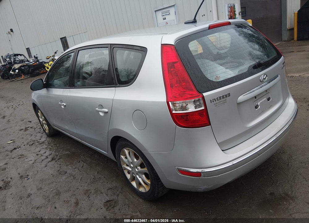 2009 HYUNDAI ELANTRA TOURING VIN: KMHDC86E69U033077