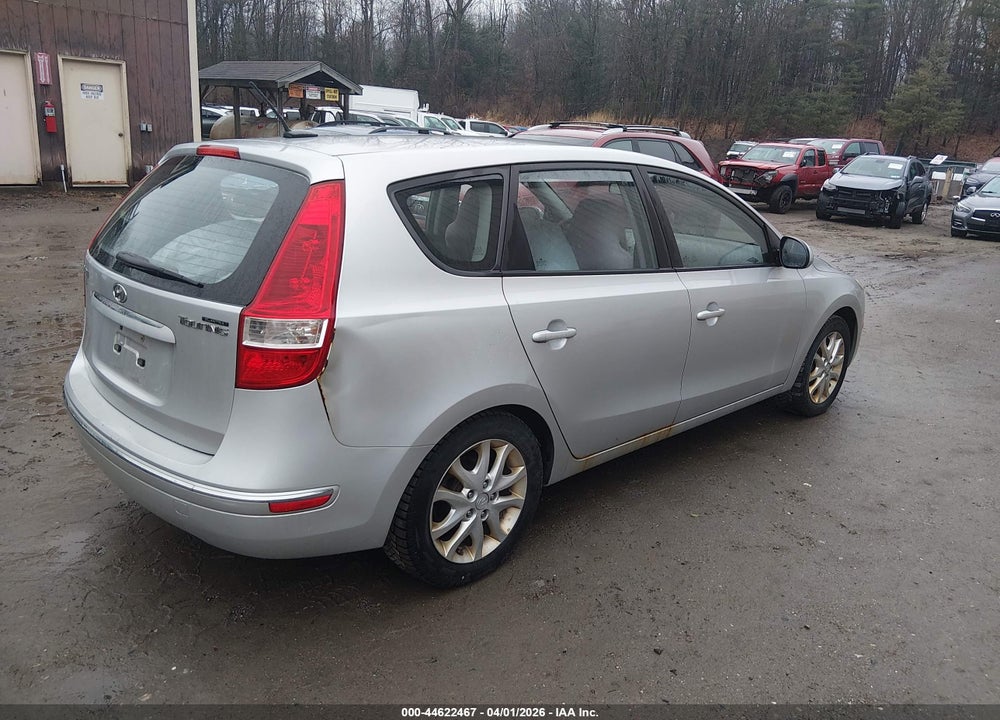 2009 HYUNDAI ELANTRA TOURING VIN: KMHDC86E69U033077