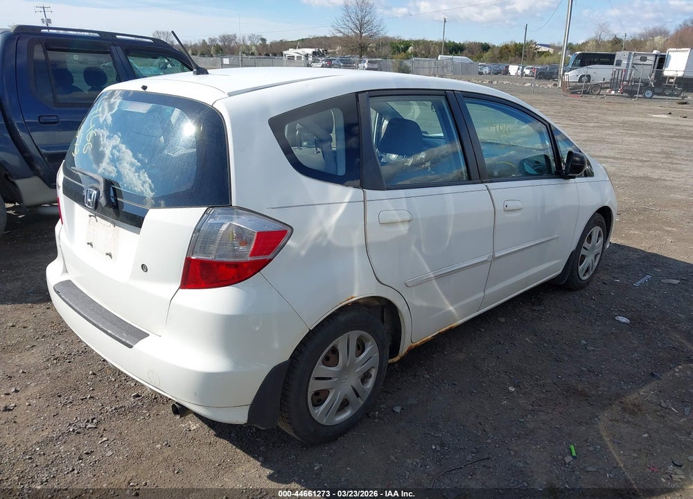 2009 HONDA FIT VIN: JHMGE87299S037277