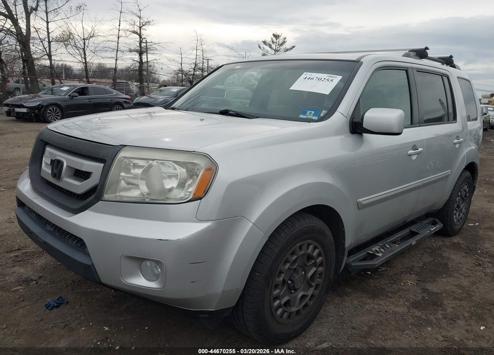 2009 HONDA PILOT EX-L VIN: 5FNYF486X9B040716