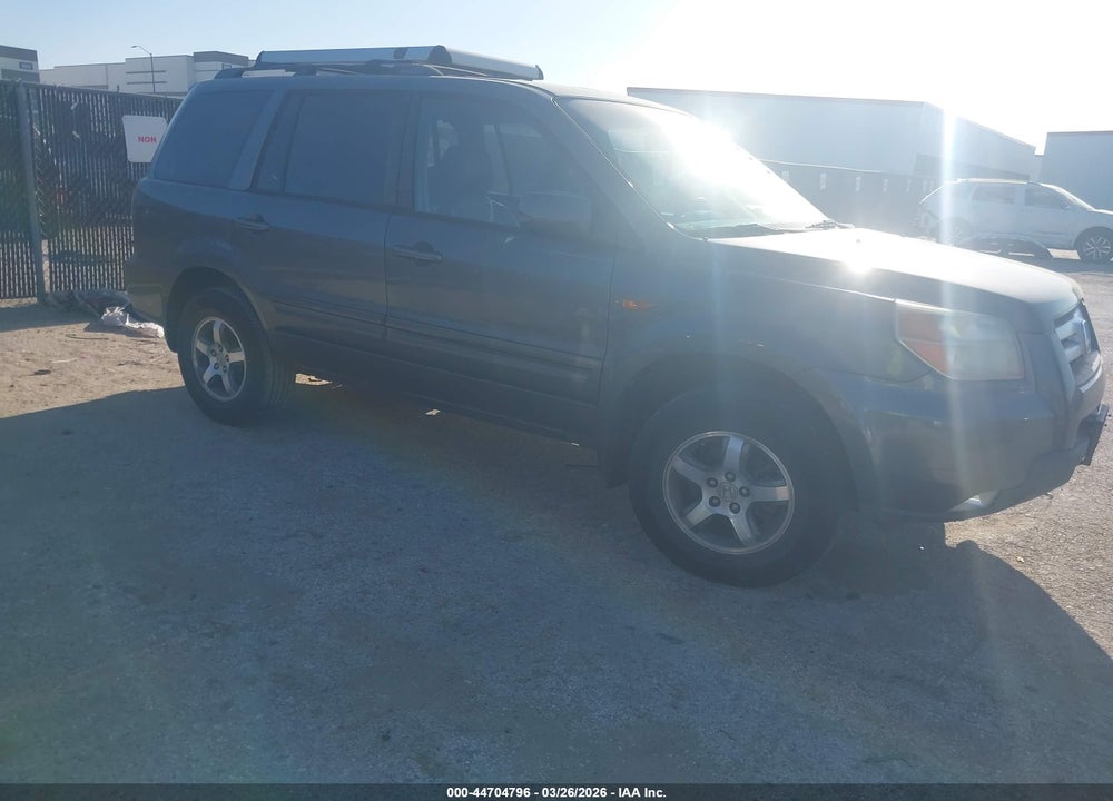 2007 HONDA PILOT EX-L VIN: 5FNYF18517B006358