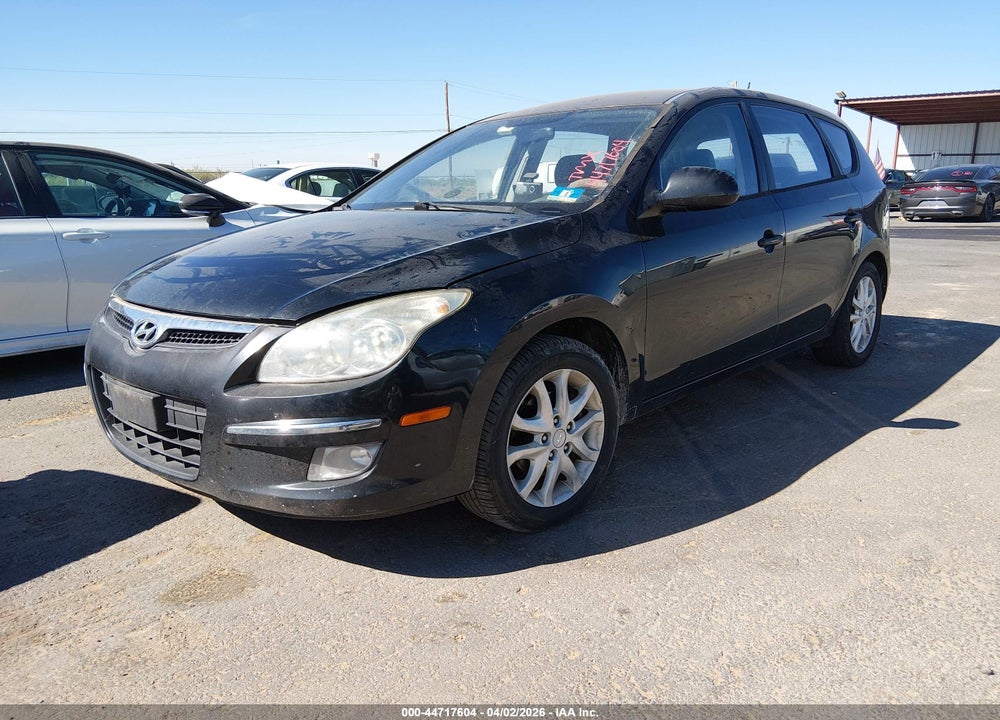 2009 HYUNDAI ELANTRA TOURING VIN: KMHDC86E79U031340