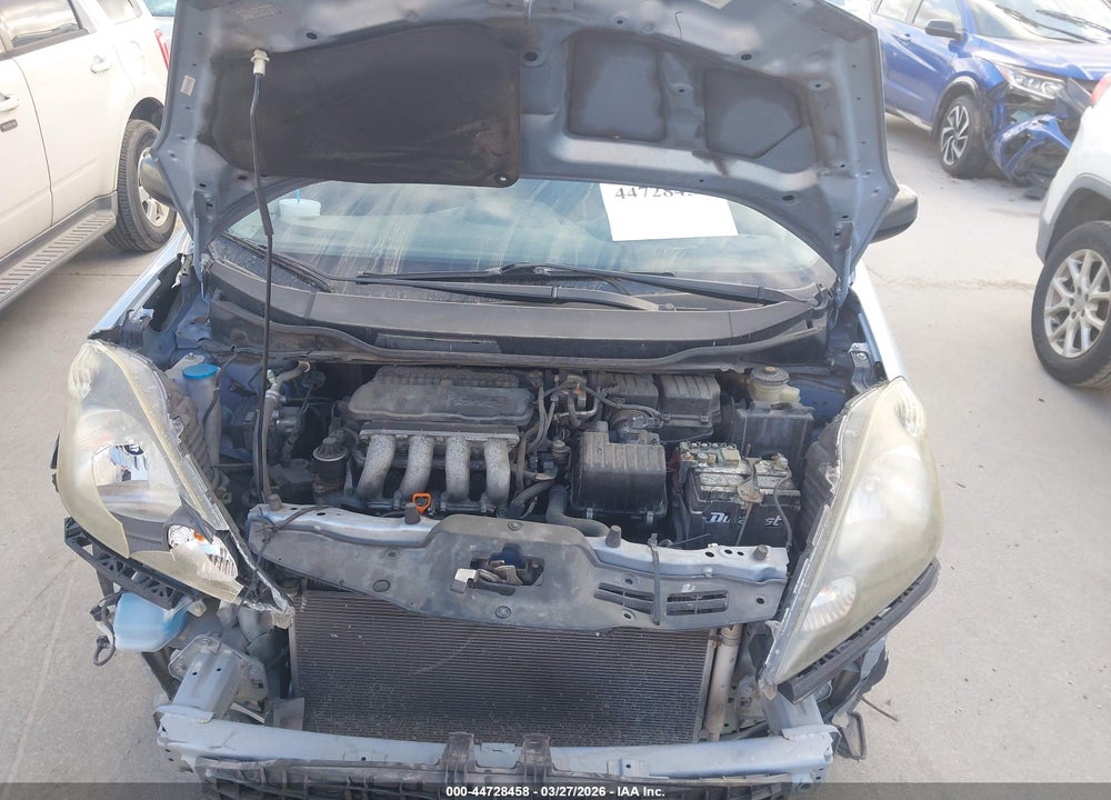 2010 HONDA FIT VIN: JHMGE8H27AC027117