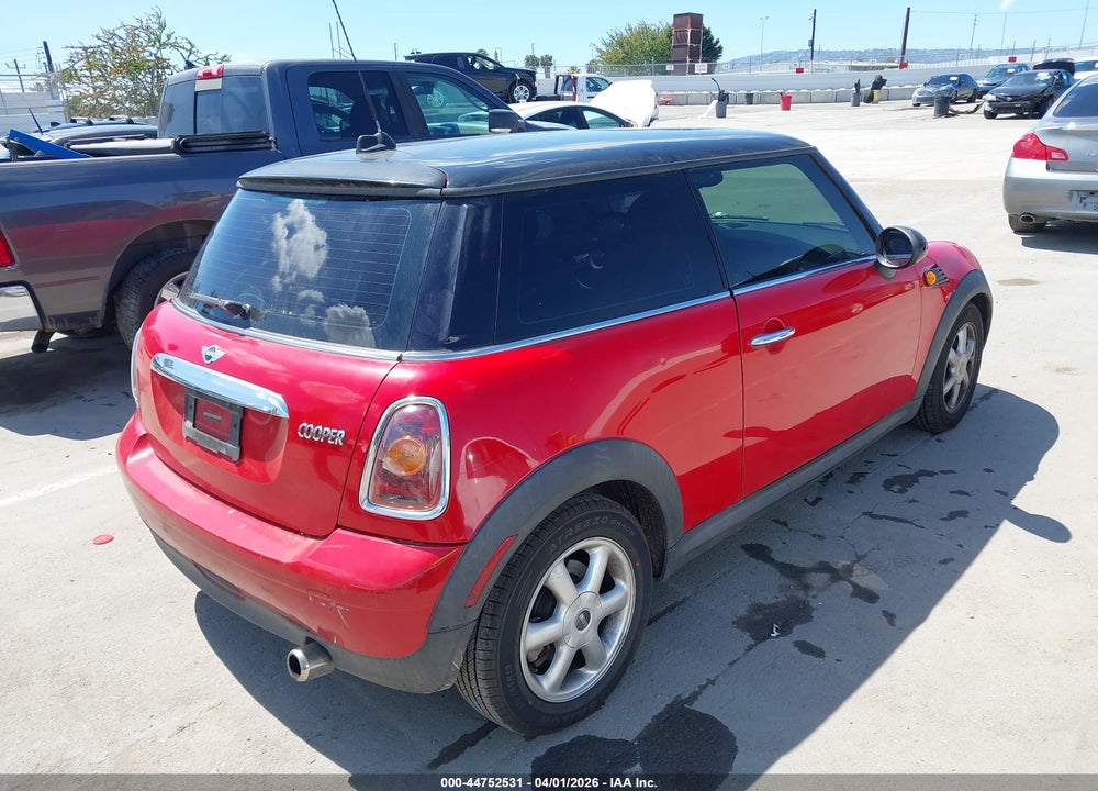 2010 MINI COOPER VIN: WMWMF3C53ATZ64498