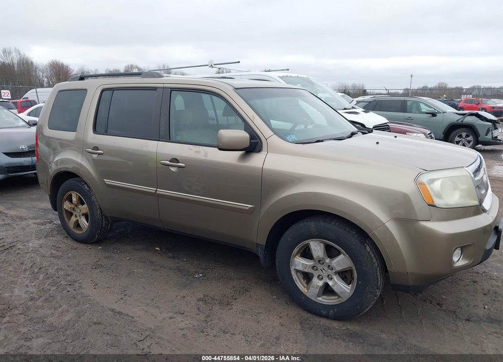 2011 HONDA PILOT EX-L VIN: 5FNYF4H57BB002583