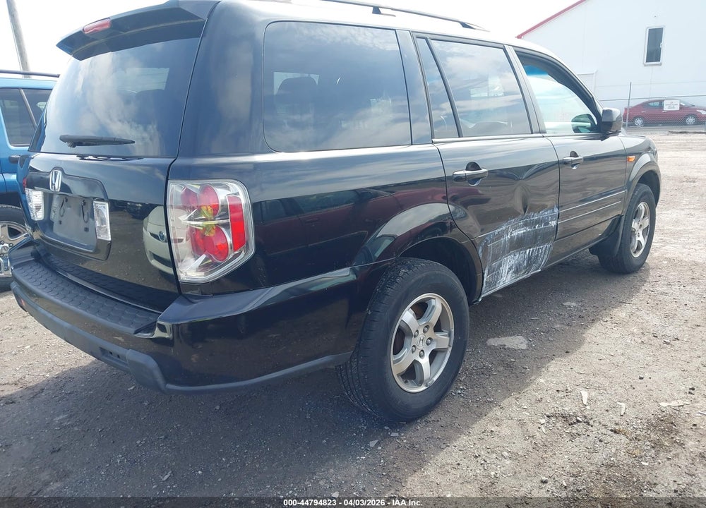 2007 HONDA PILOT EX-L VIN: 5FNYF28527B004589