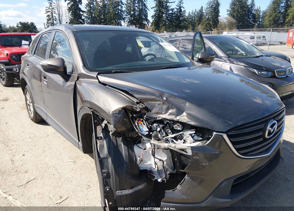 2016 MAZDA CX-5 TOURING VIN: JM3KE4CYXG0647140