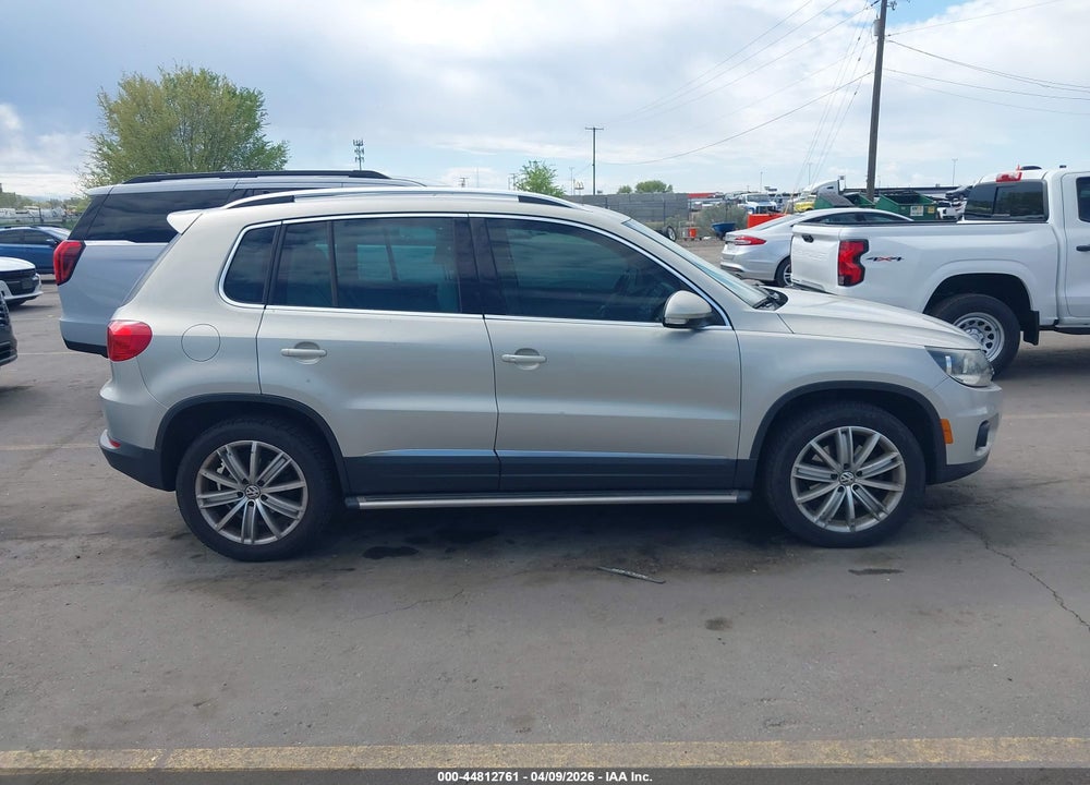 2014 VOLKSWAGEN TIGUAN SEL VIN: WVGBV3AX8EW591735