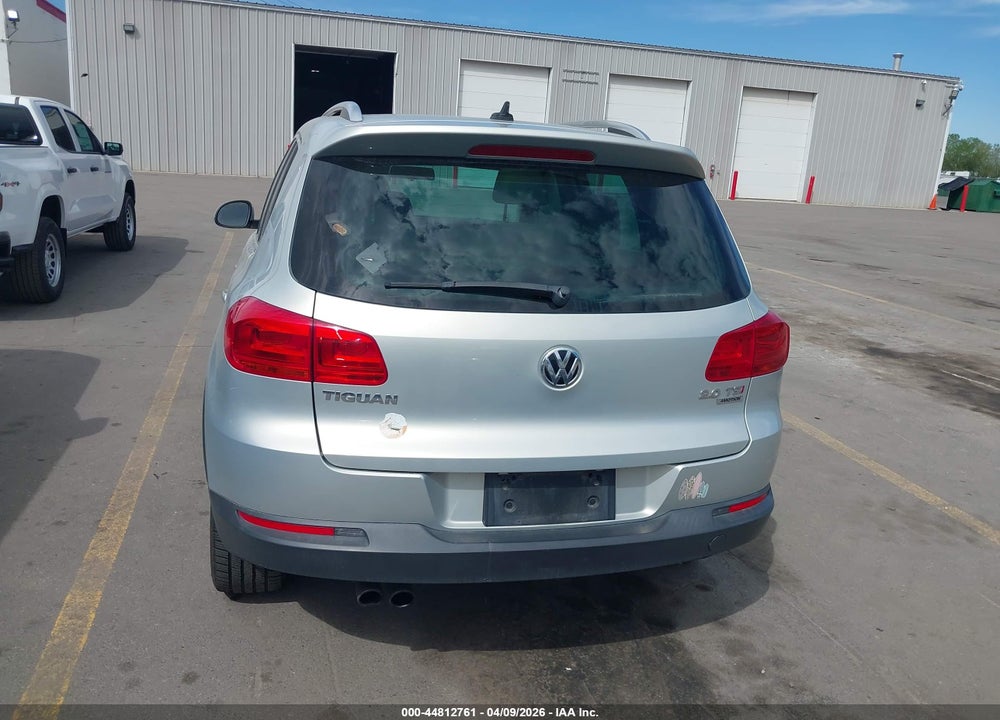 2014 VOLKSWAGEN TIGUAN SEL VIN: WVGBV3AX8EW591735
