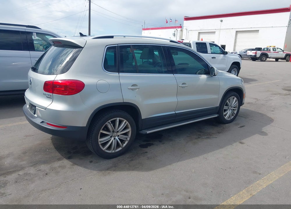2014 VOLKSWAGEN TIGUAN SEL VIN: WVGBV3AX8EW591735