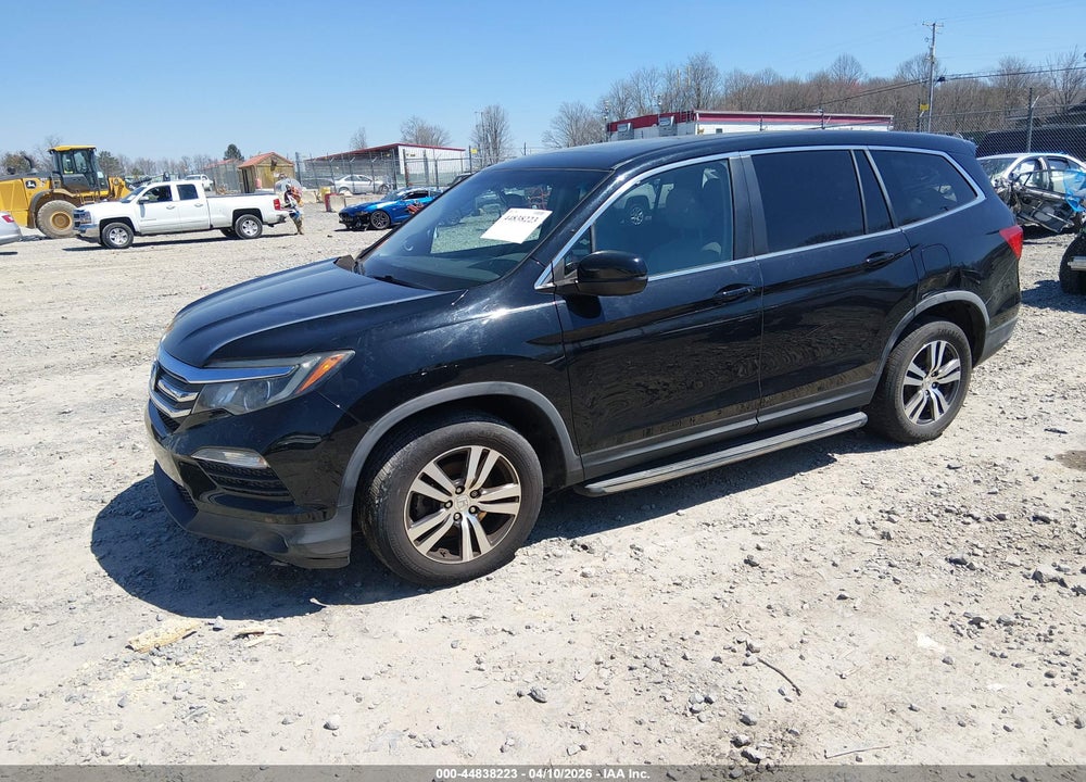 2016 HONDA PILOT EX-L VIN: 5FNYF5H80GB034153