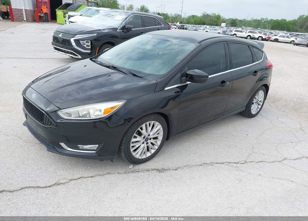 2016 FORD FOCUS TITANIUM VIN: 1FADP3N29GL260209