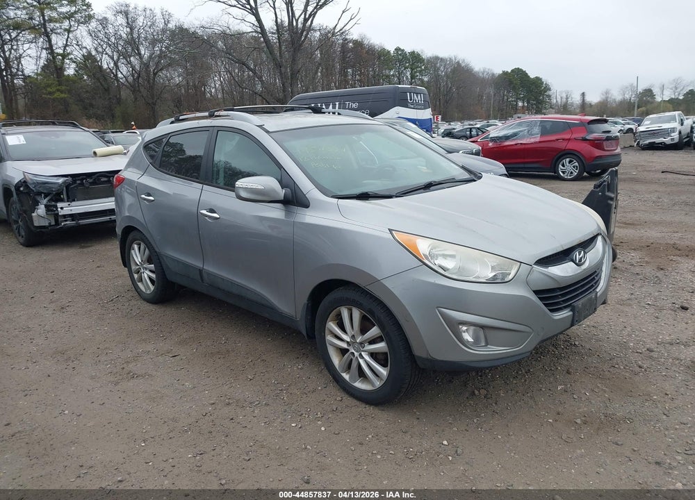 2012 HYUNDAI TUCSON LIMITED VIN: KM8JUCACXCU424524