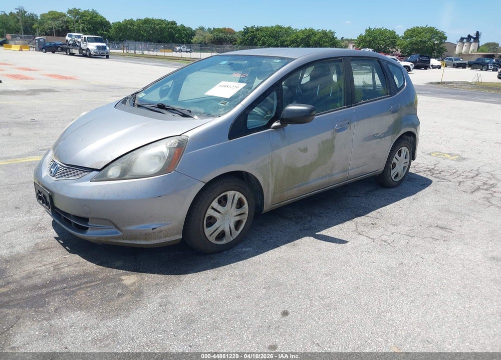 2009 HONDA FIT VIN: JHMGE87289S069704