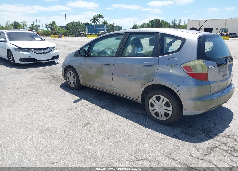 2009 HONDA FIT VIN: JHMGE87289S069704