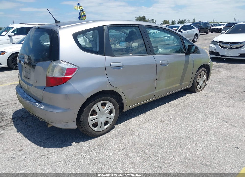 2009 HONDA FIT VIN: JHMGE87289S069704