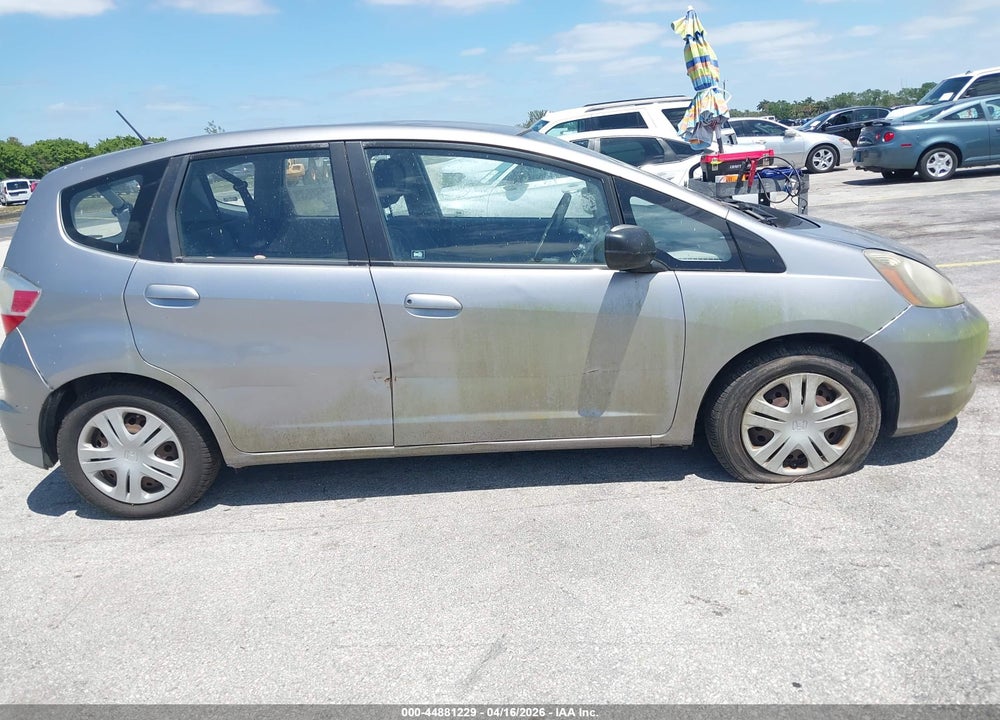 2009 HONDA FIT VIN: JHMGE87289S069704