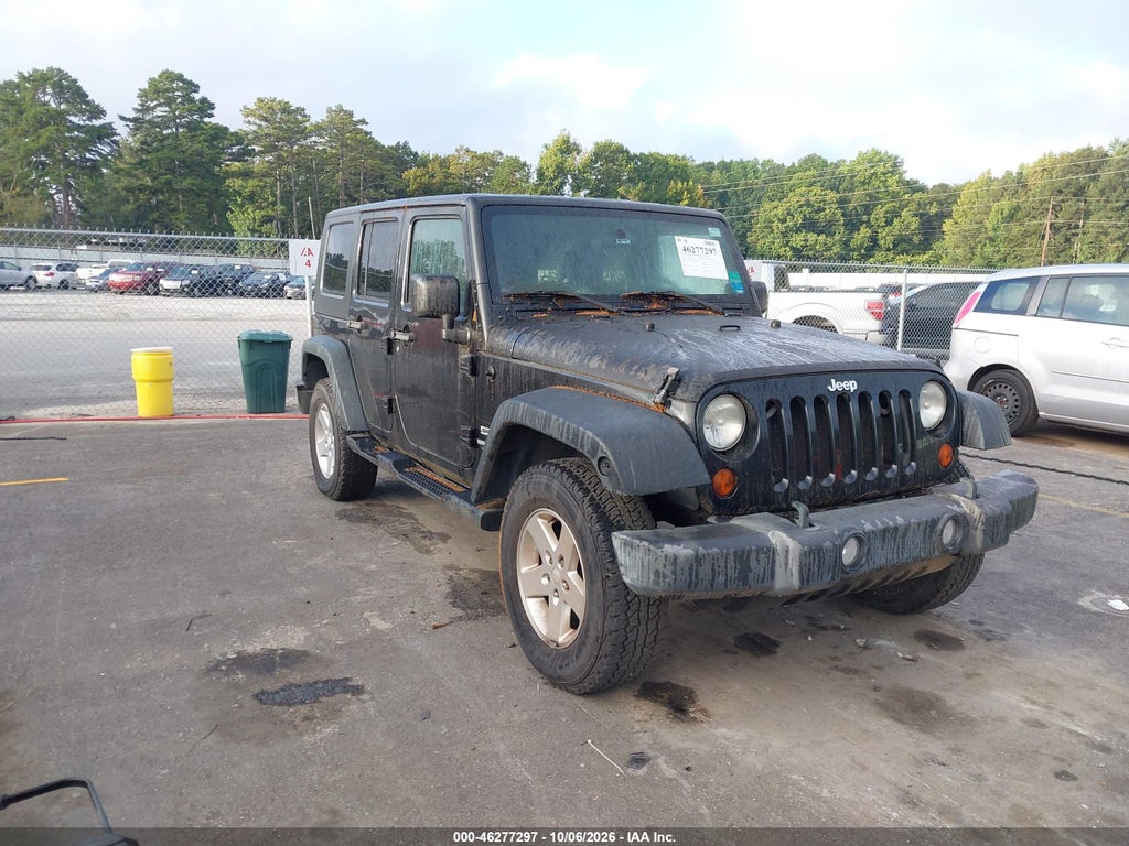 2010 Jeep Wrangler Unlimited Sport photo 1